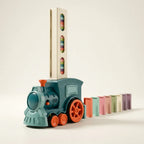 Domino train that lays the dominoes, studio photo