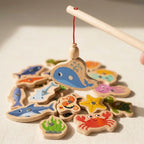 Montessori wooden fishing game, close-up of the key movement