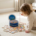Montessori wooden fishing game being played with at home