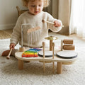 Montessori wooden music set for toddlers being played with at home