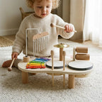 Montessori wooden music set for toddlers being played with at home