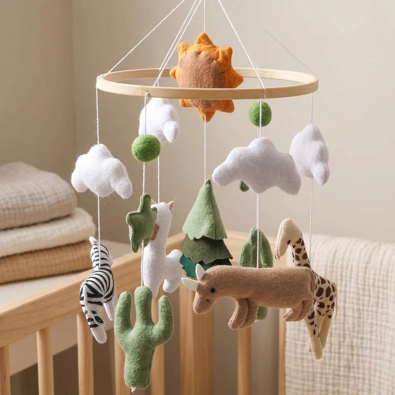 Close-up of the hand-stitched wool felt on the Cactus Savanna crib mobile