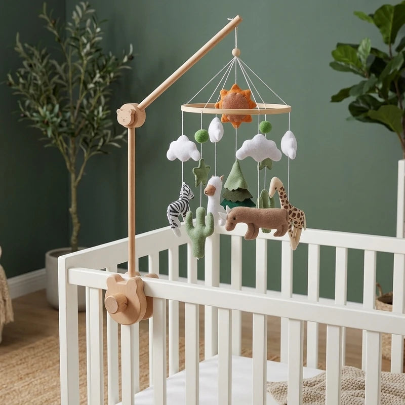 Wooden baby crib mobile, Cactus Savanna design, clamped on a crib rail in a safari nursery