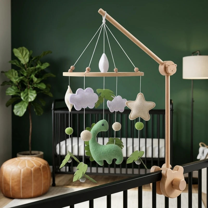 Wooden baby crib mobile, Green Dinosaur design, clamped on a crib rail in a safari nursery