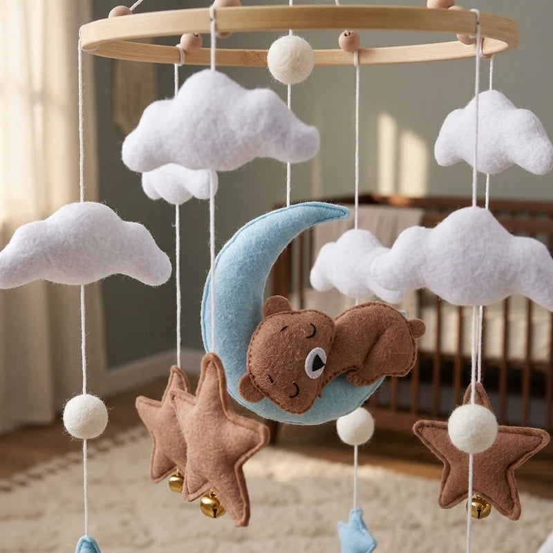 Close-up of the hand-stitched wool felt on the Blue Moon Bear crib mobile